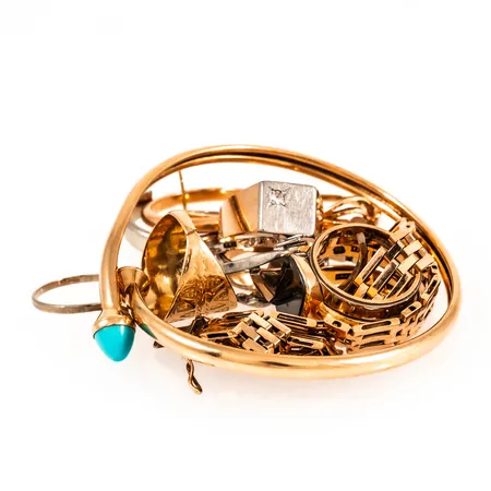 Diverse defekt/graverat guld 18K 77,2g.