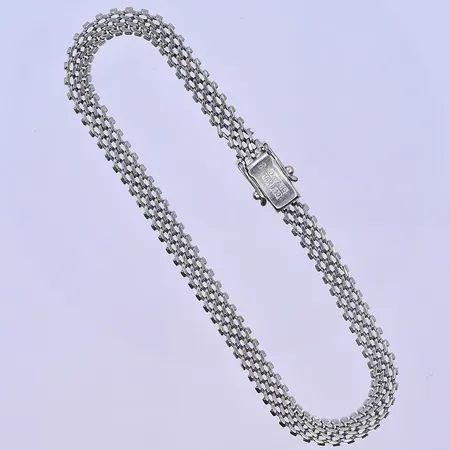 Armband längd 20cm, bredd 5 mm vitguld 18K. Vikt: 12 g