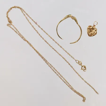 Guldskrot defekt 18K.  Vikt: 2,9 g