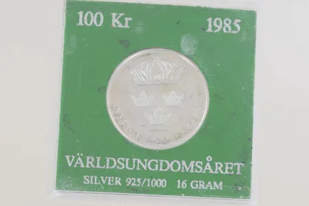 Mynt 100kr år 1985 världsungdomsåret, 925/1000 Vikt: 16 g