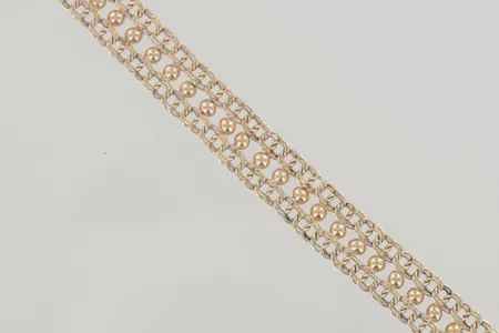 Armband, längd 19 cm bredd 1 cm, ojämn 14K Vikt: 12,7 g
