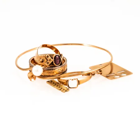 Diverse defekt/graverat guld 18K 24,7g 