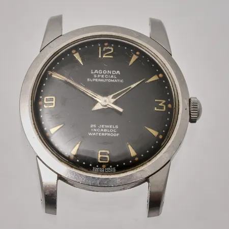 Armbandsur Lagonda Special Super automatic, stål, Ø34,5mm, boettnr 11117-57, repor på glas, defekt.