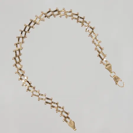Armband 20,5cm bredd 7,1mm, bucklor, ojämnheter, 18K, Vikt: 9,1 g