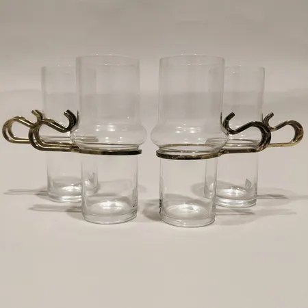 Fyra Irish Coffeeglas Orrefors med handtag i gul metall, höjd ca 13,5cm, metall sliten Skickas med paket.