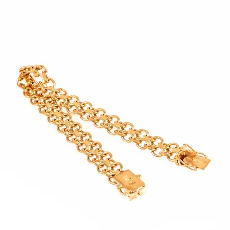 Armband X-länk längd 19,5cm bredd 9,2mm, 18K 24,7g.