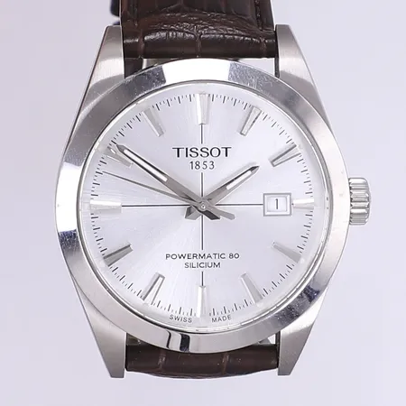 Herrur Tissot Gentleman automat Ø40mm refnr T127407A serienr: FD6955F78 läderband box med personlig gravyr