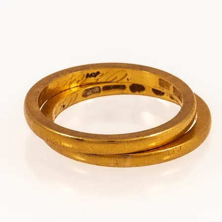 Två släta ringar 23K 7,5g. Stl:18¼.