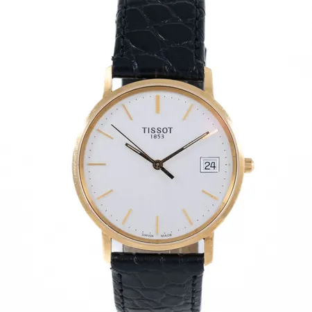 Herrur Tissot 18K med läderband. Boett Ø 33,5 mm med minnesgravyr. Quartz- går ej- batterbyte krävs?
