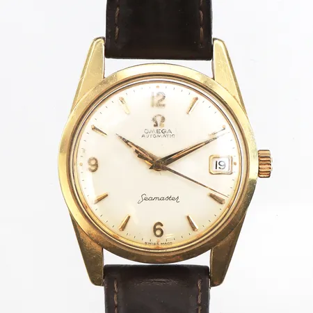 Herrur Omega Seamaster 34mm, automatisk, datum, guld på stål, boettnr: 14701-4SC, verknr: 18012682, cal 562, slitet brunt läderband, inga tillbehör