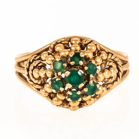 Ring med gröna stenar stl:18 bredd 2,4 - 12,7 mm 4,7g 18K.