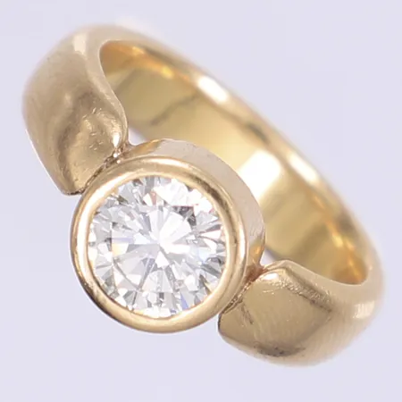 Ring med diamant 1x ca 1,25ct ca VS-SI stl:17¼ bredd 5-9mm otydlig tillverkarstämpel Göteborg 1997 18K Vikt: 9,2 g