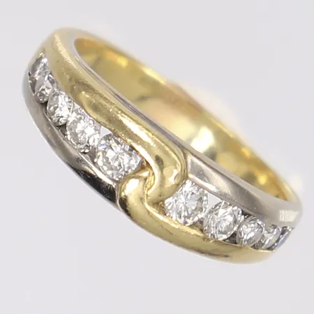 Ring med diamanter 2x ca 0,05ct, 2x ca 0,06ct, 2x ca 0,07ct, 2x ca 0,10ct, 2x ca 0,12ct, totalt ca 0,80ctv, stl:18 bredd 3-5mm, tillverkare Salvini, Italien, vitguld/rödguld 18K Vikt: 6,3 g