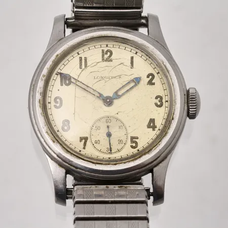 Armbandsur Longines, stål, manuell, Ø33,5mm, verknr 6510518, refnr 22359 54, datum, flexband personlig gravyr på boett, repor på glas. Vikt: 0 g