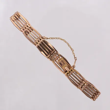 Armband längd ca 16,5cm bredd 10mm, säkerhetskedja. 14K Vikt: 17,3 g