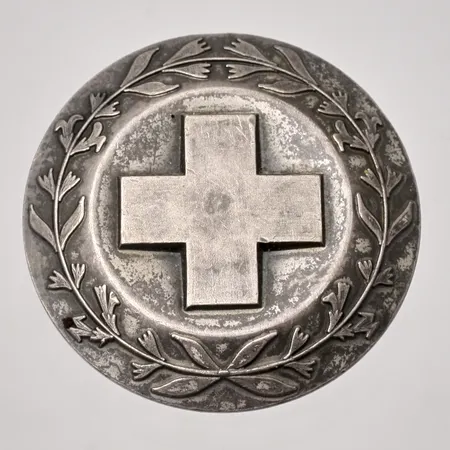 Sjuksköterskebrosch Ø30,8mm, 830/1000 silver, 12,31g.