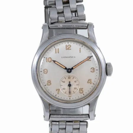 Äldre herrur Longines i stål, manuellt urverk, boett Ø 33 mm nr: 23460 230. Repigt plastglas. Metallband ej original. 1940-tal.