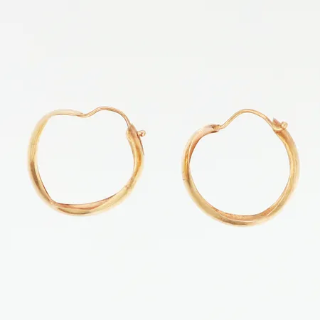 Ett par örhängen Ø15mm, skevheter, 18K Vikt: 0,9 g