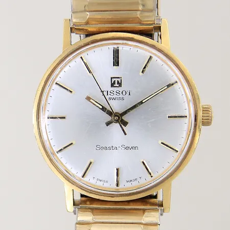 Herrur Tissot Seastar Seven 18K manuell Ø34mm plexiglas med repor flexiband doublè gravyr inga tillbehör
