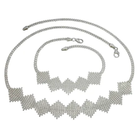 SET - Collier + Armband silver 925/1000, längd 42,5 resp. 18,5 cm, dekor bredd 14,5 mm Vikt: 11,7 g