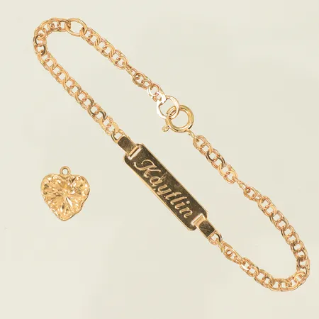 Diverse guld, armband, hänge hjärta, gravyr, defekt 18K Vikt: 3,1 g