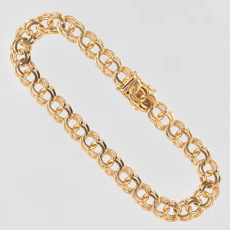 Armband Bismarck längd 21cm bredd 8,5mm trögt kistlås 18K Vikt: 24,7 g