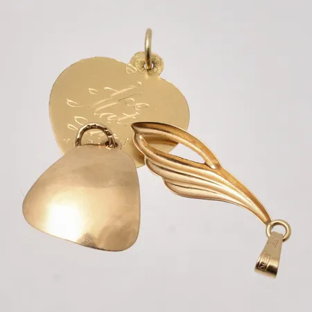 Diverse defekt guld, 18K, 2,57g.