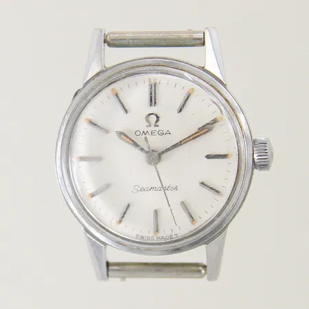 Omega Seamaster stål manuell Ø22mm plexiglas samt boett med repor saknar länk/band inga tillbehör
