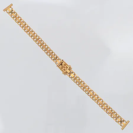 Klockarmband X-länk längd 16cm bredd 7mm, 10mm i änden, 18K  Vikt: 13,1 g