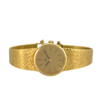 Damur Omega i 18K guld, Ø20 mm, manuell, handledsmått max 17 cm, bruttovikt 39,2g Vikt: 39,2 g