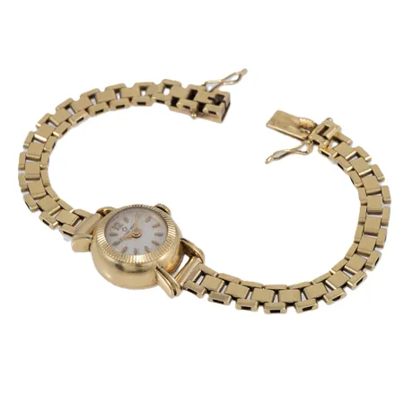 Defekt damur Eterna Matic 18K med 18K band. Boett Ø 17,4 mm. Bruttovikt 25,2g. Går ej.