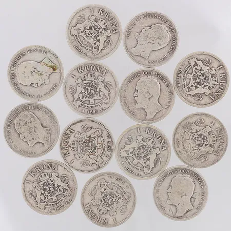 13 Mynt Oscar II 1kr år 1897-98, 800/1000 silver  Vikt: 94,2 g