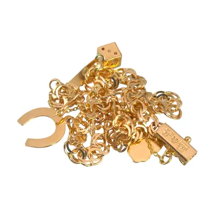 Armband Bismarck med berlocker, 18K guld, defekt Vikt: 7,8 g