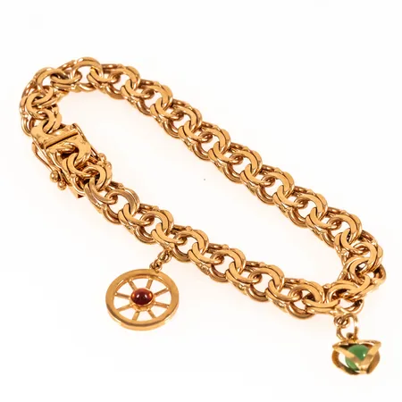 Armband Bismarck med två berlocker längd 19,5 cm bredd 8,4 mm 26,2g 18K.