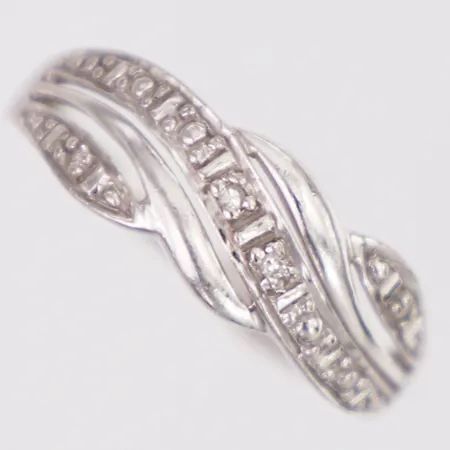 Ring med diamanter 4 x ca0,005ct stl:17 bredd 1,8-6,7mm, vitguld, GHA, 18K  Vikt: 2,2 g