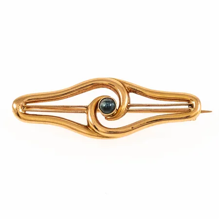 Brosch med en blå/grön sten 43x14,5mm, 18K 2,9g.