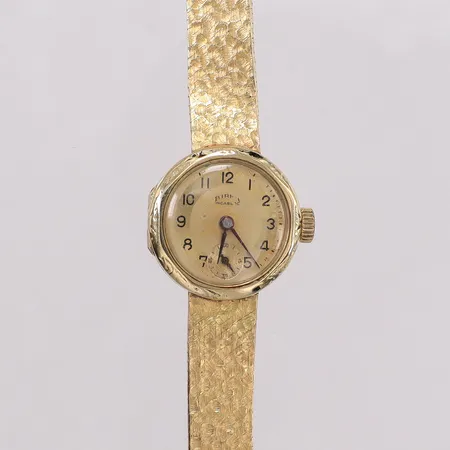 Damur Birka 14K manuell 21mm boettnr:366, liten sekundvisare, hamrad länk 18K ca 19cm inkl boett, skadad urtavla, skadad bezel, buckligt armband. Bruttovikt 34,2g
