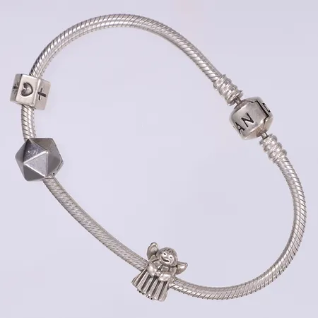 Armring med 4 berlocker Pandora berlockerna stämplade ALE 925 Ø65mm bruksslitage silver 925/1000 Vikt: 23,3 g