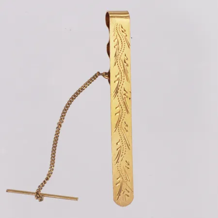 Slipshållare med dekor längd 55mm 18K  Vikt: 4,6 g