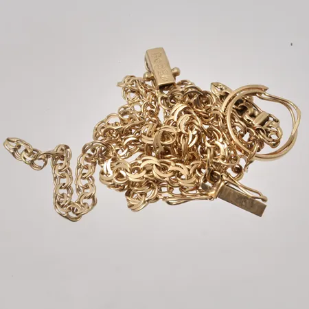 Diverse defekt guld, 18K, 8,24g.