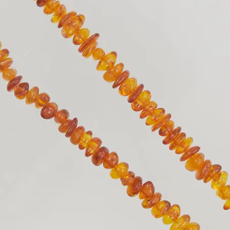 Bärnstescollier ca 86cm bredd ca 8-11mm.