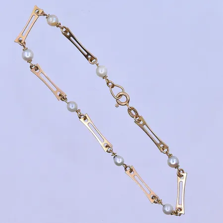 Armband med pärlor längd 19,5 cm, bredd 3-4 mm 18K. Vikt: 3,5 g
