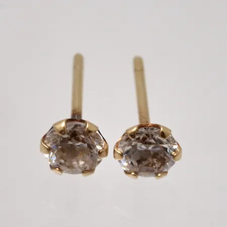 Örhängen mått Ø4,5mm, vita stenar, 18K, saknar snurrebussar, 0,49g.