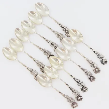 12 moccaskedar Rosen längd 10,5cm, skevheter på skaft, silver 830/1000 Vikt: 131,3 g