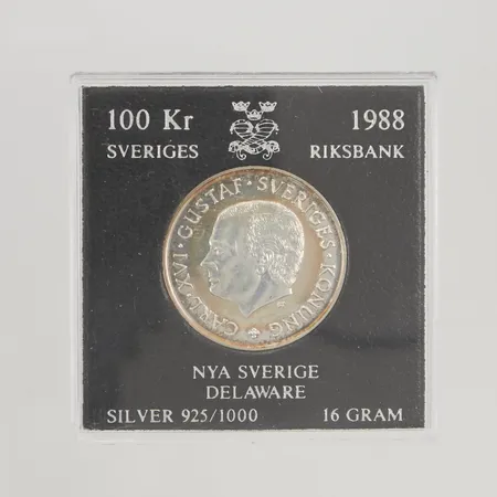 Minnesmynt 100kr Nya Sverige Delaware år 1988, Ø32mm, etui, 925/1000 Silver 16,0g.