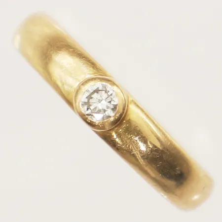 Ring Efva Attling med diamant 1x0,19ct, stl:15¾ bredd 4,5mm 18K Vikt: 10,4 g