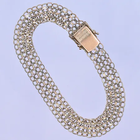 Armband X-länk längd 19,5 cm, bredd 10 mm 18K. Vikt: 11,3 g