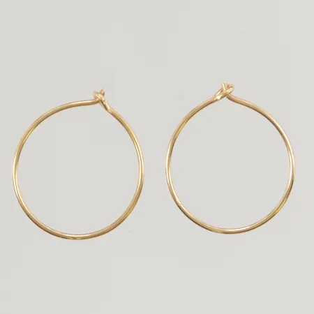 Örhängen 16mm något skeva, 18K 0,5g.