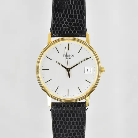 Herrur Tissot 14K, quartz, Ø34mm, datum, läderband, graverad bakboett, behov av batteribyte, etui, box. bruttovikt 29,1g.