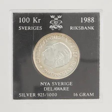 Minnesmynt 100kr Nya Sverige Delaware år 1988, Ø32mm, etui, 925/1000 Silver 16,0g.